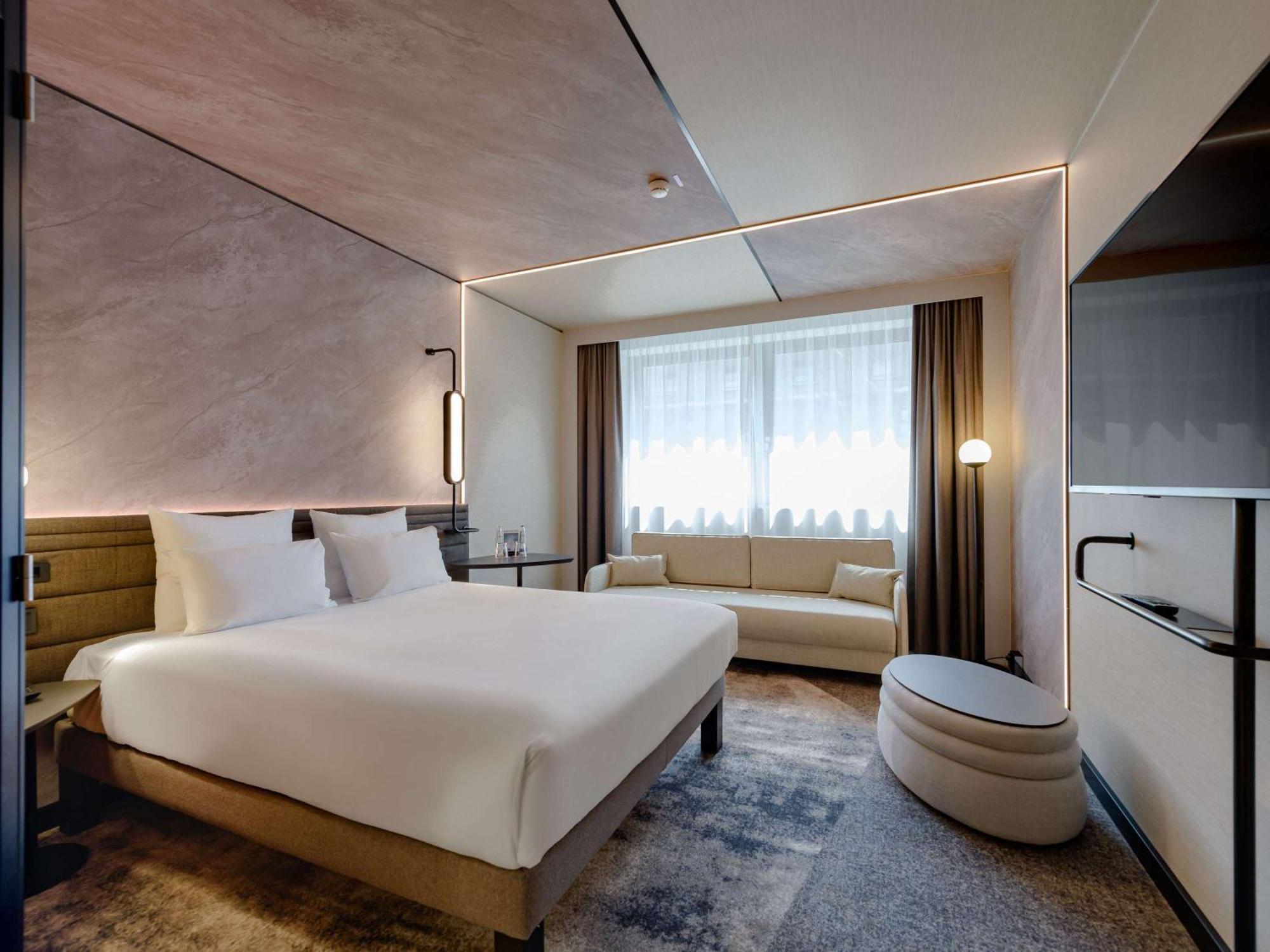 Novotel Muenchen Airport - Newly Renovated Frisinga Esterno foto A room at the hotel